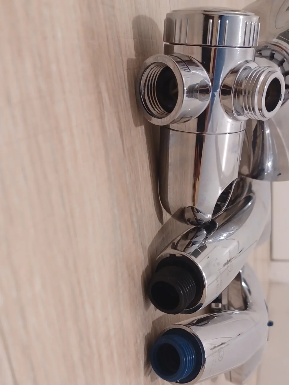 Bundle of chrome shower heads with flexible hose. Bath. Hand held.
